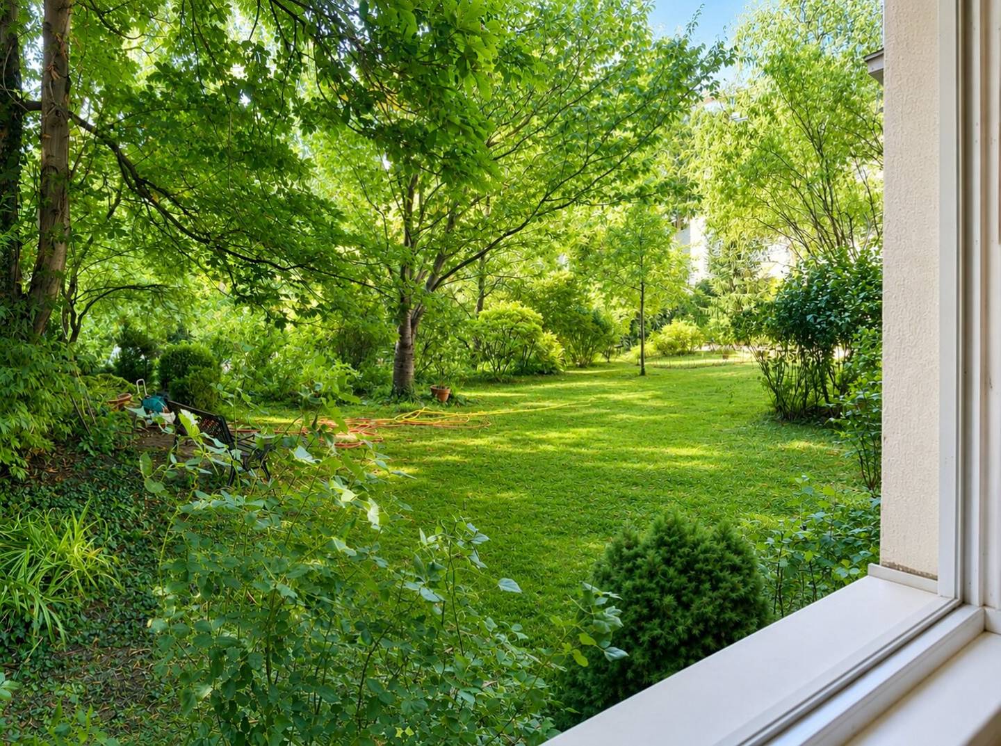 Ground floor apartment with view of greenery and fitted kitchen