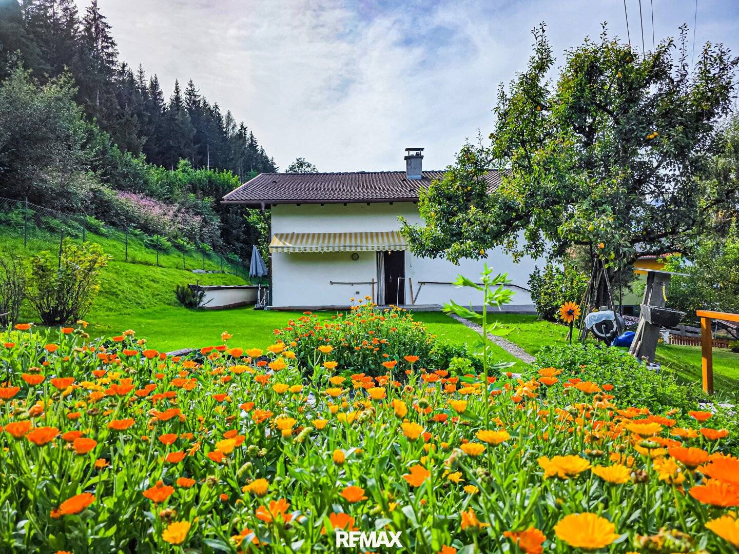 Einfamilienhaus mit Garten und Garage am Pollingberg