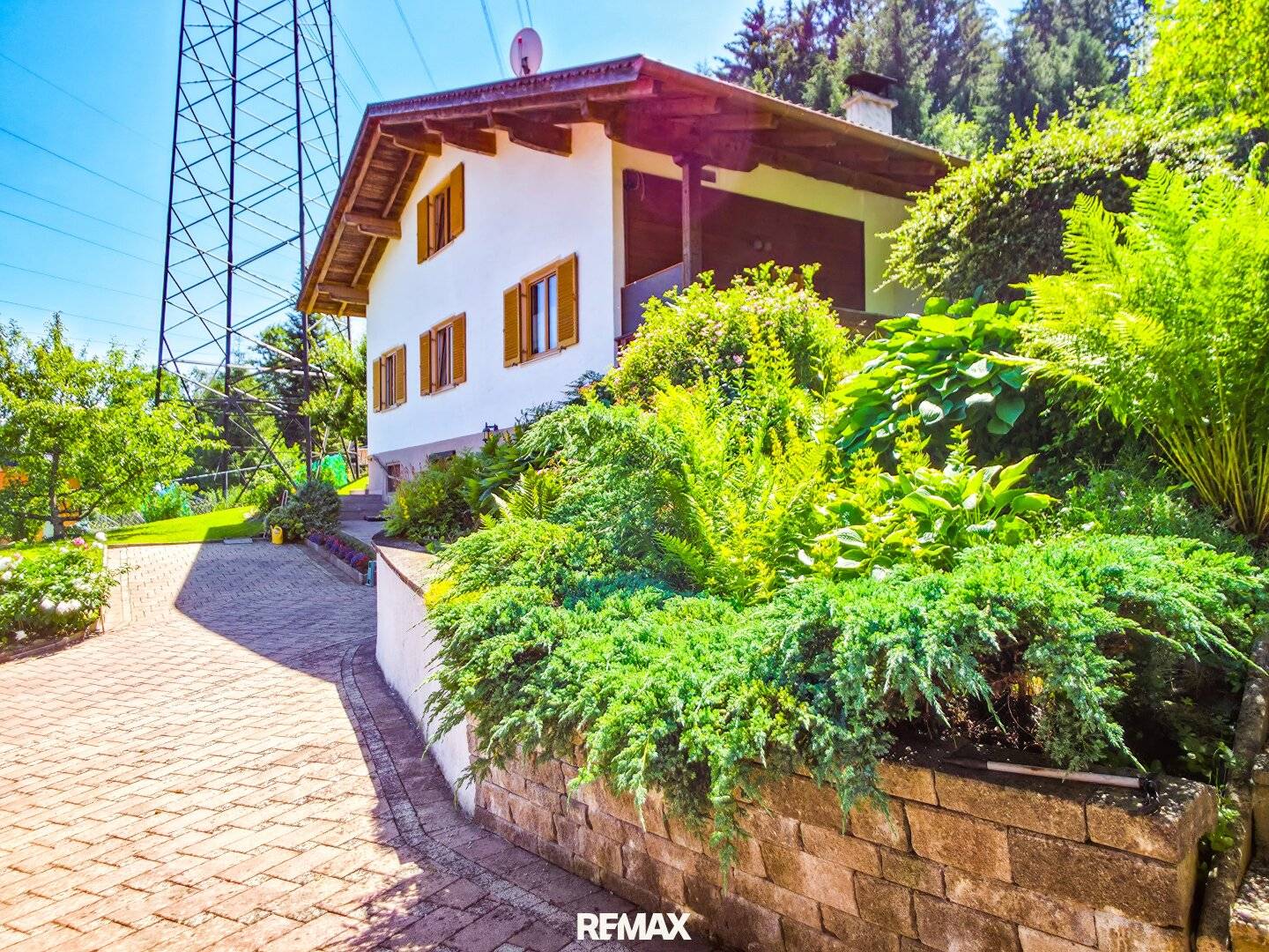 Einfamilienhaus mit Garten und Garage am Pollingberg