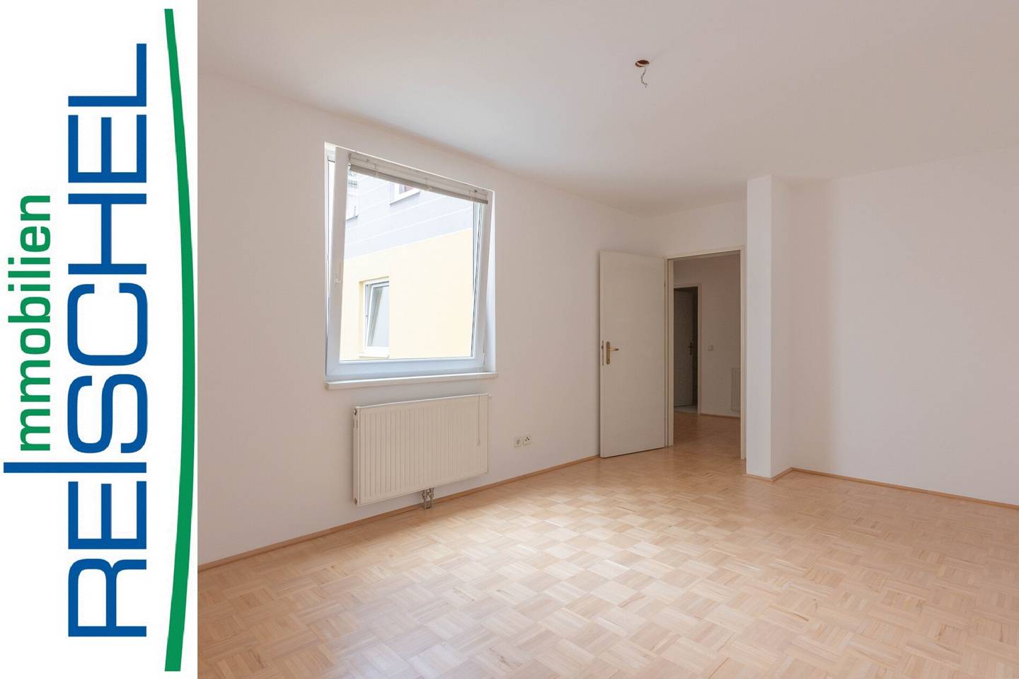 Quiet courtyard apartment with balcony view in elevator building