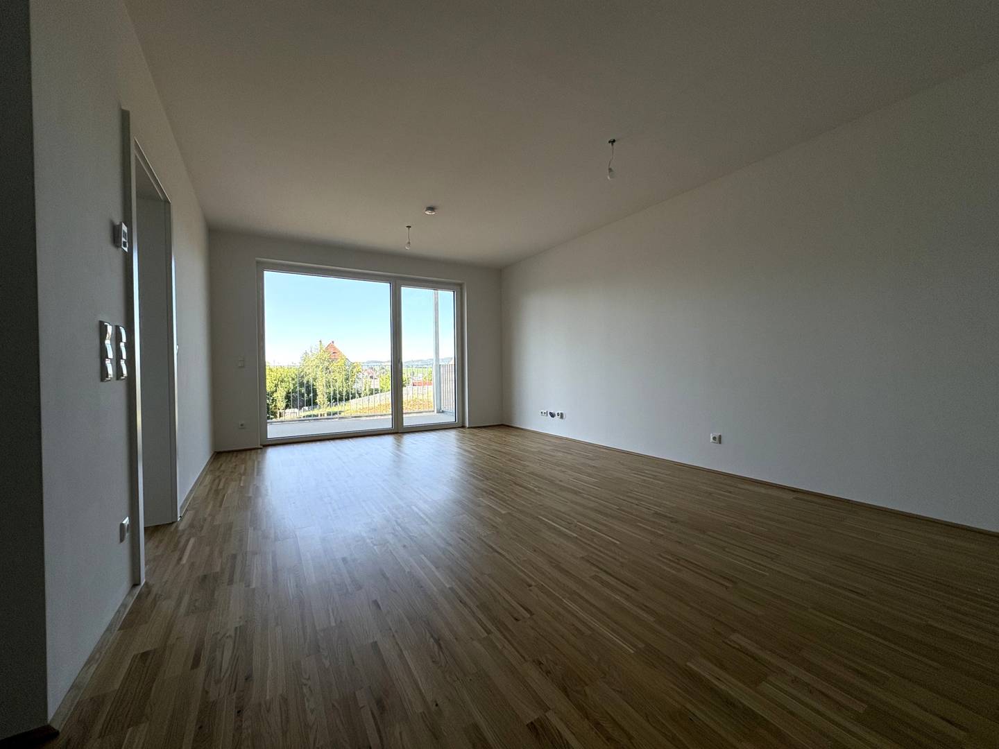 Sunny apartment with balcony and courtyard view