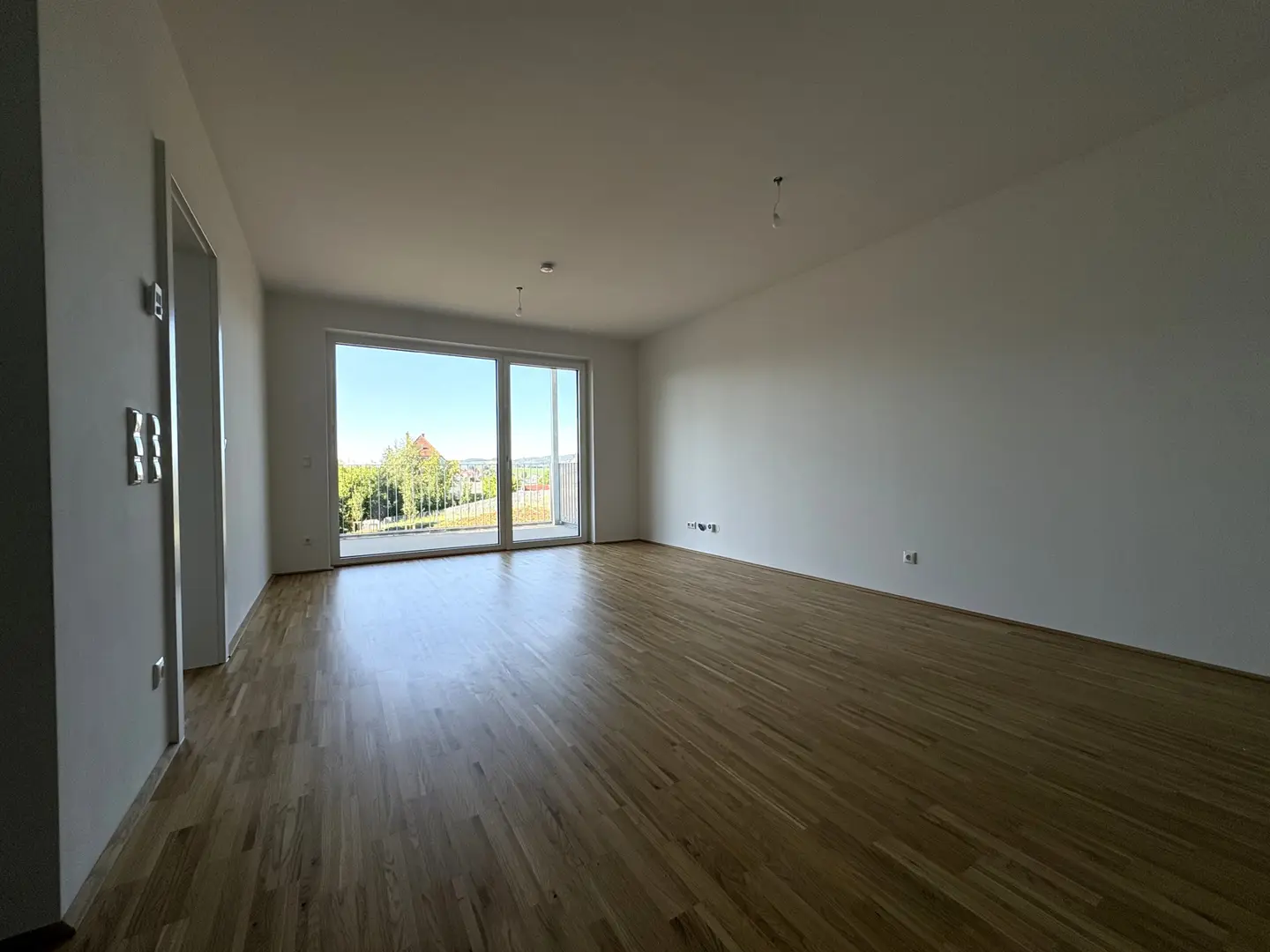 Sunny apartment with balcony and courtyard view