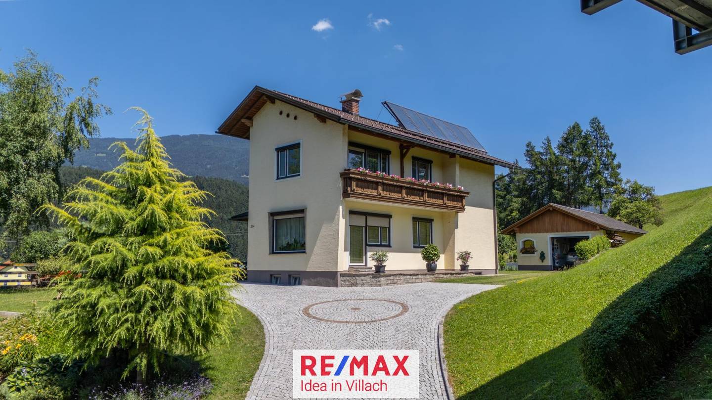 Gepflegtes Einfamilienhaus mit großem Grundstück und Garage