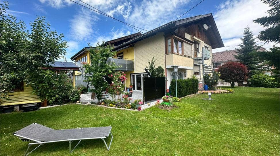 Multi-family house with conservatory sauna and garage