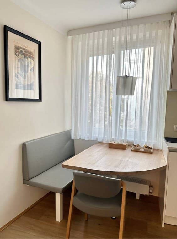 Renovated apartment with hardwood floors and fitted kitchen