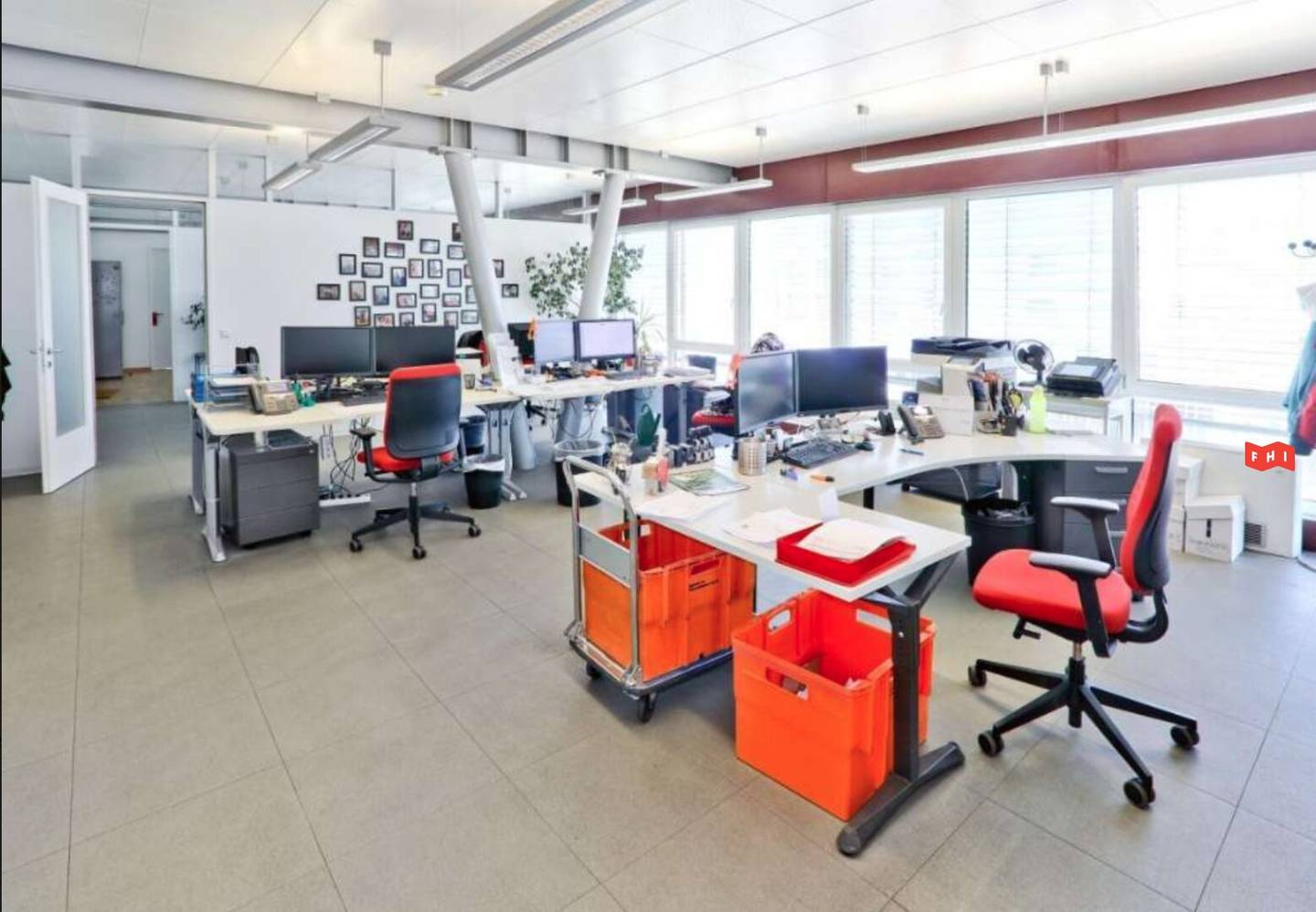 Modern commercial property with office and warehouse space and a historic building