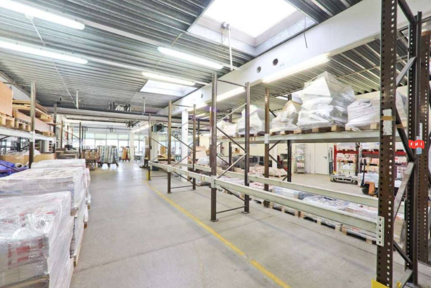 Modern commercial property with office and warehouse space and a historic building