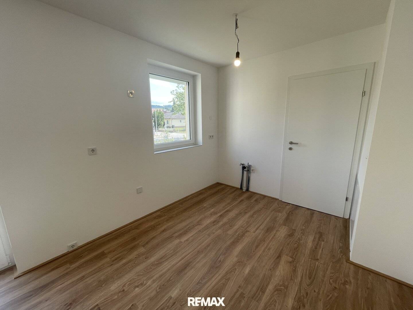 Neubauwohnung mit Balkon und Stellplatz
