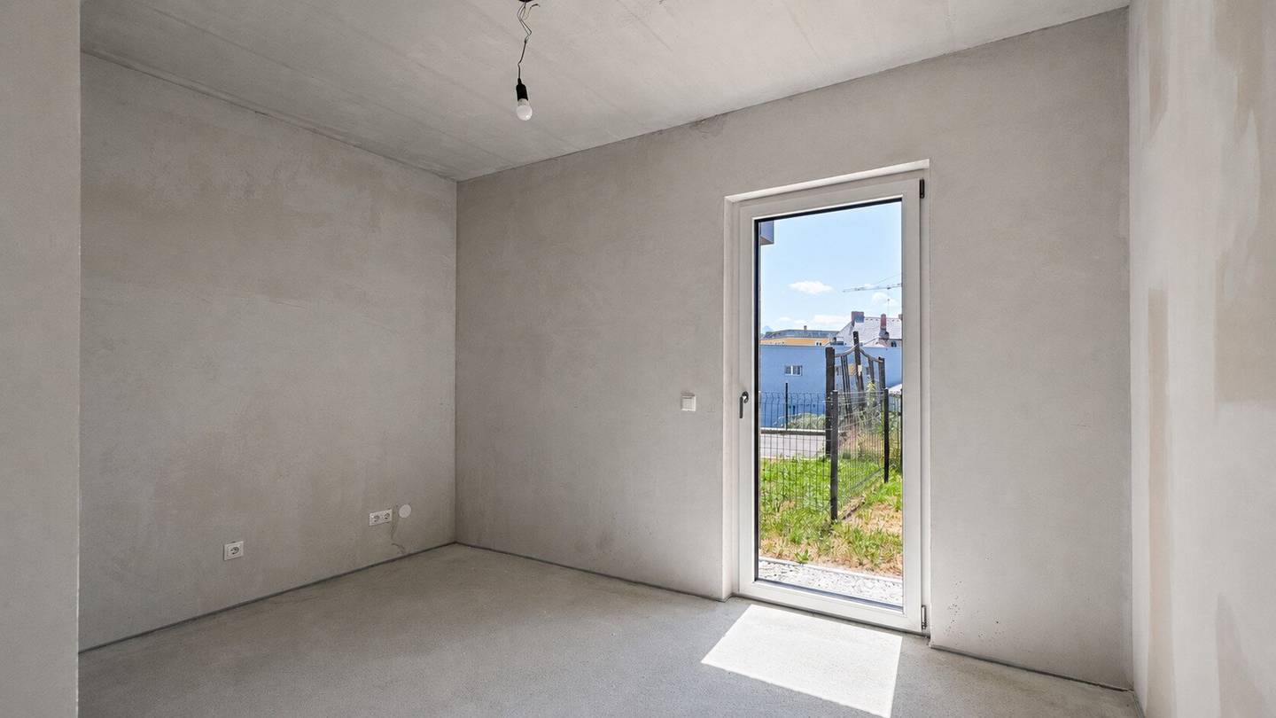 Neubauwohnung mit Garten und Terrasse im Stadtzentrum