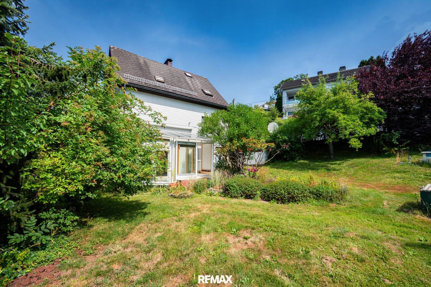 Zweifamilienhaus mit Wintergarten und Garten in St Magdalena