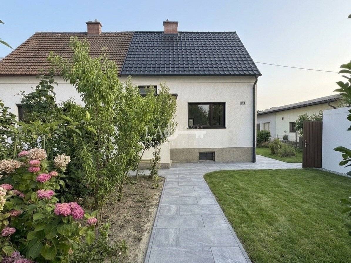 Saniertes Doppelhaus mit Garten und Garage nahe Freibad