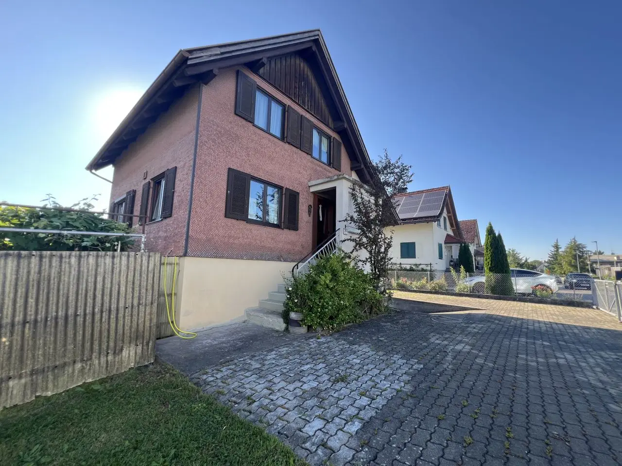 Sunny building plot with existing structure in quiet location