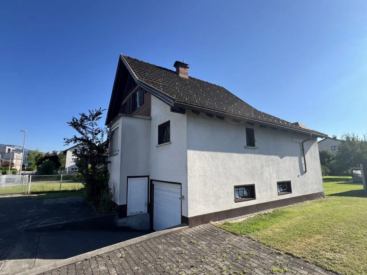 Sunny building plot with existing structure in quiet location
