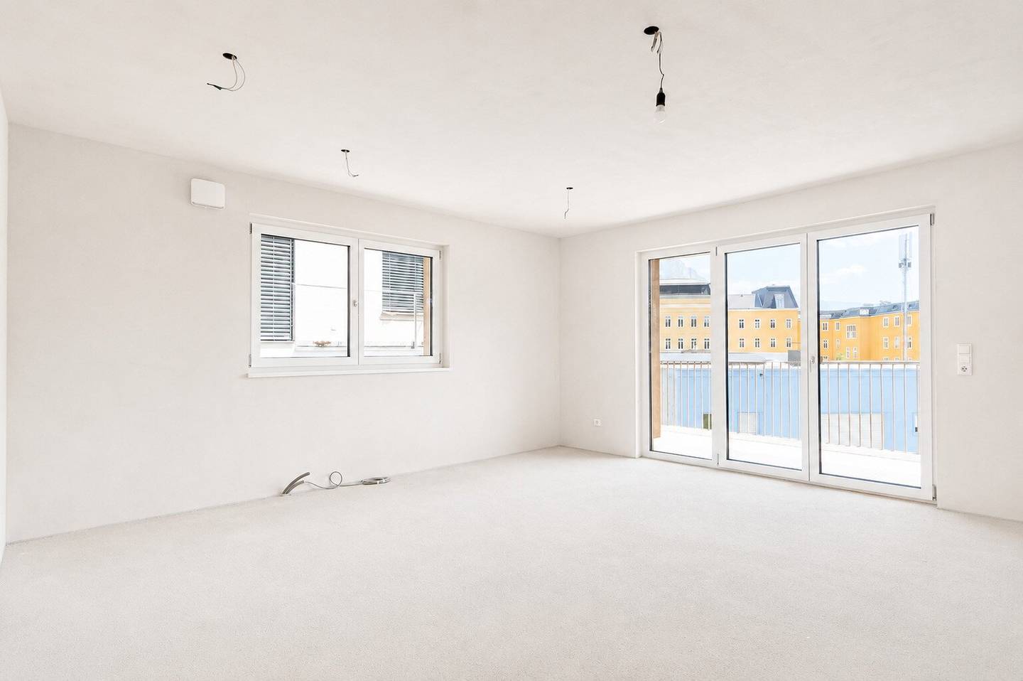 Neubauwohnung mit Balkon und Bergblick im Stadtzentrum
