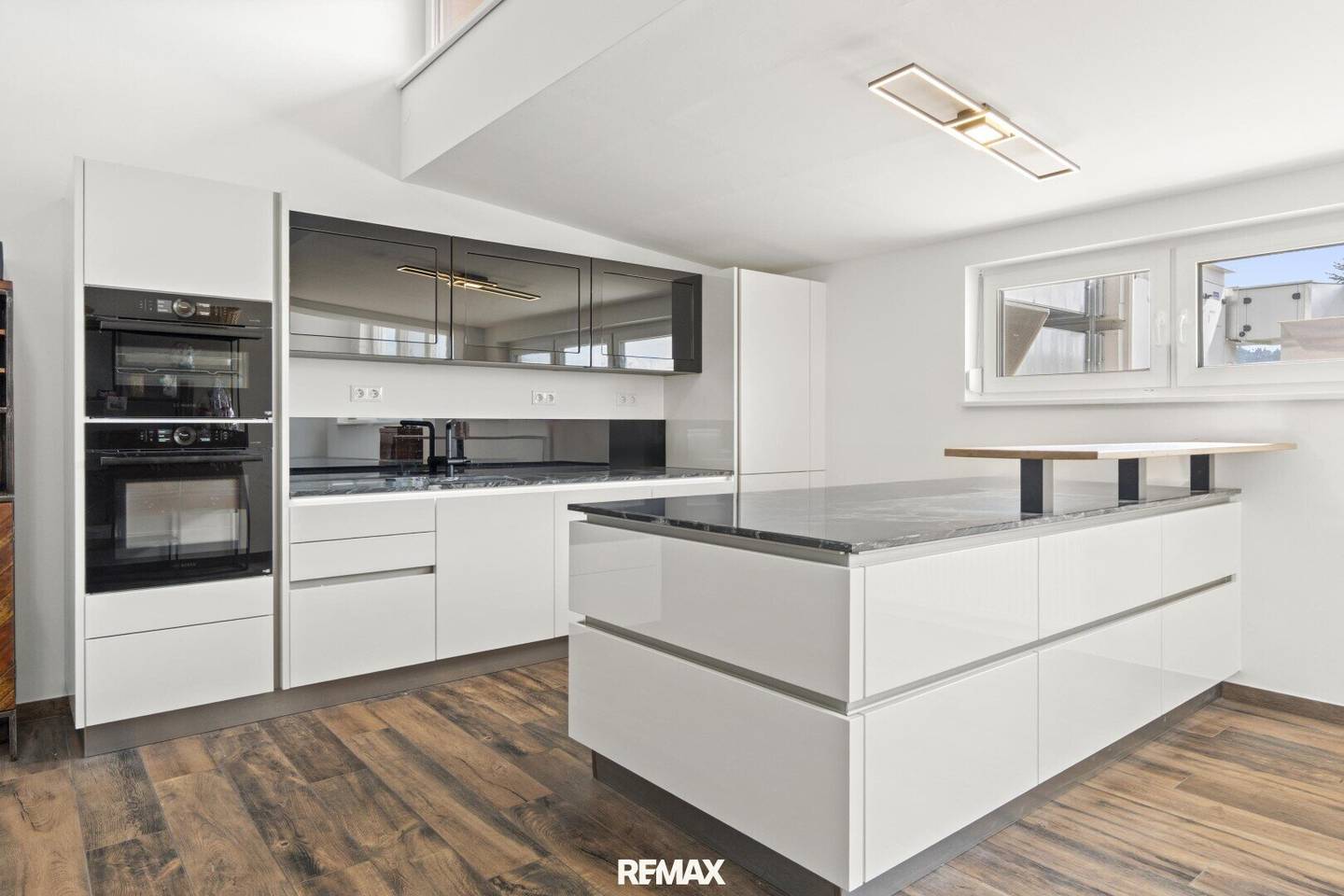 Penthouse mit Dachterrasse und Gartenblick