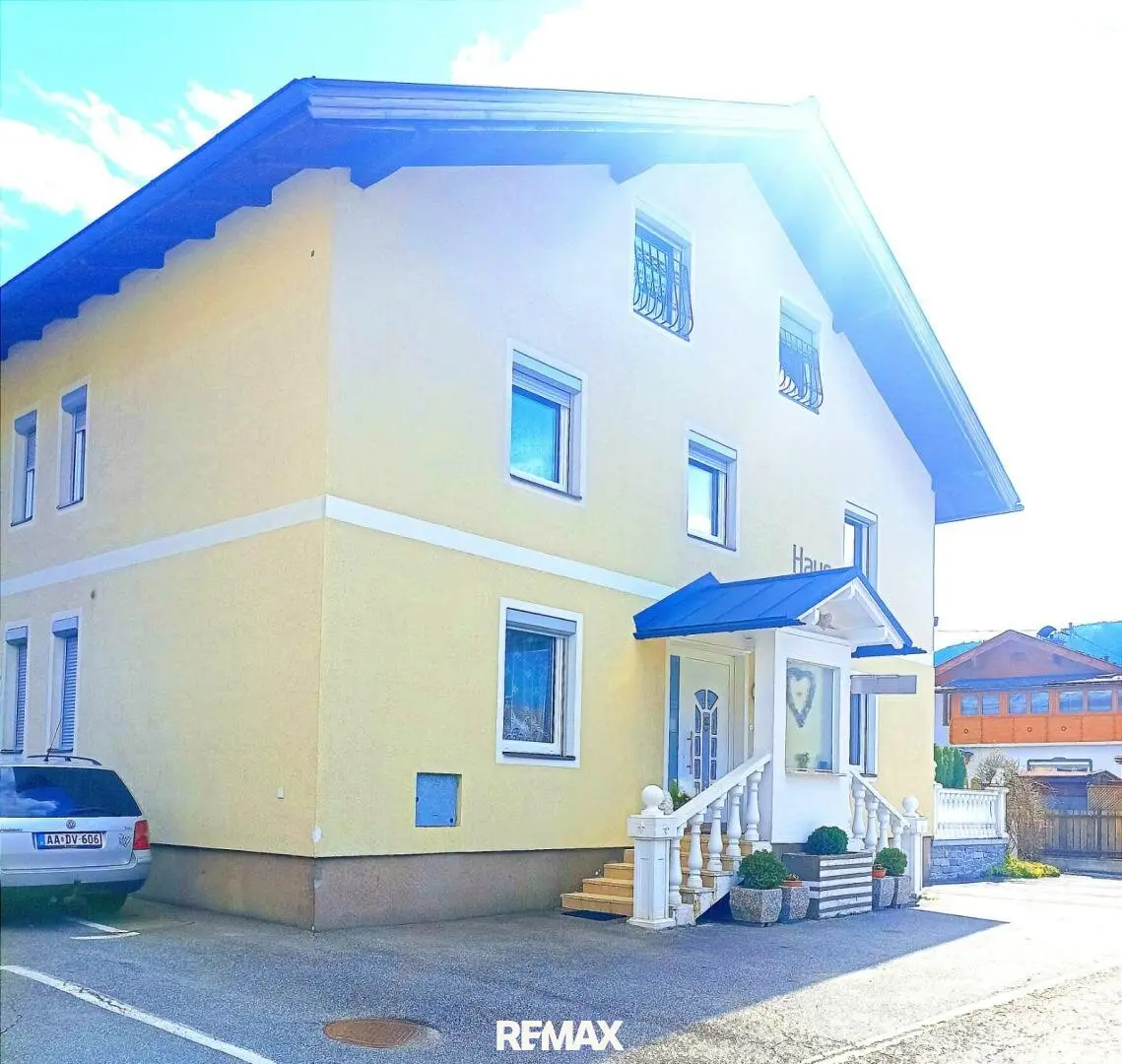 Multi-family house with garden and solar system in quiet location