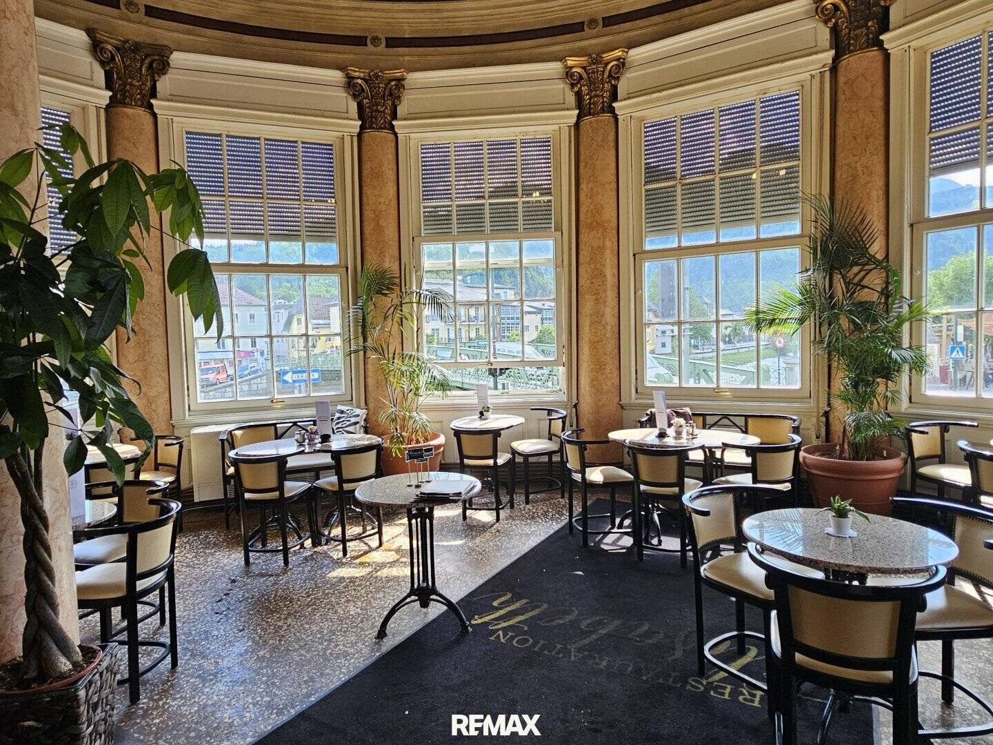 Gastronomy in historic building with view of the Traun