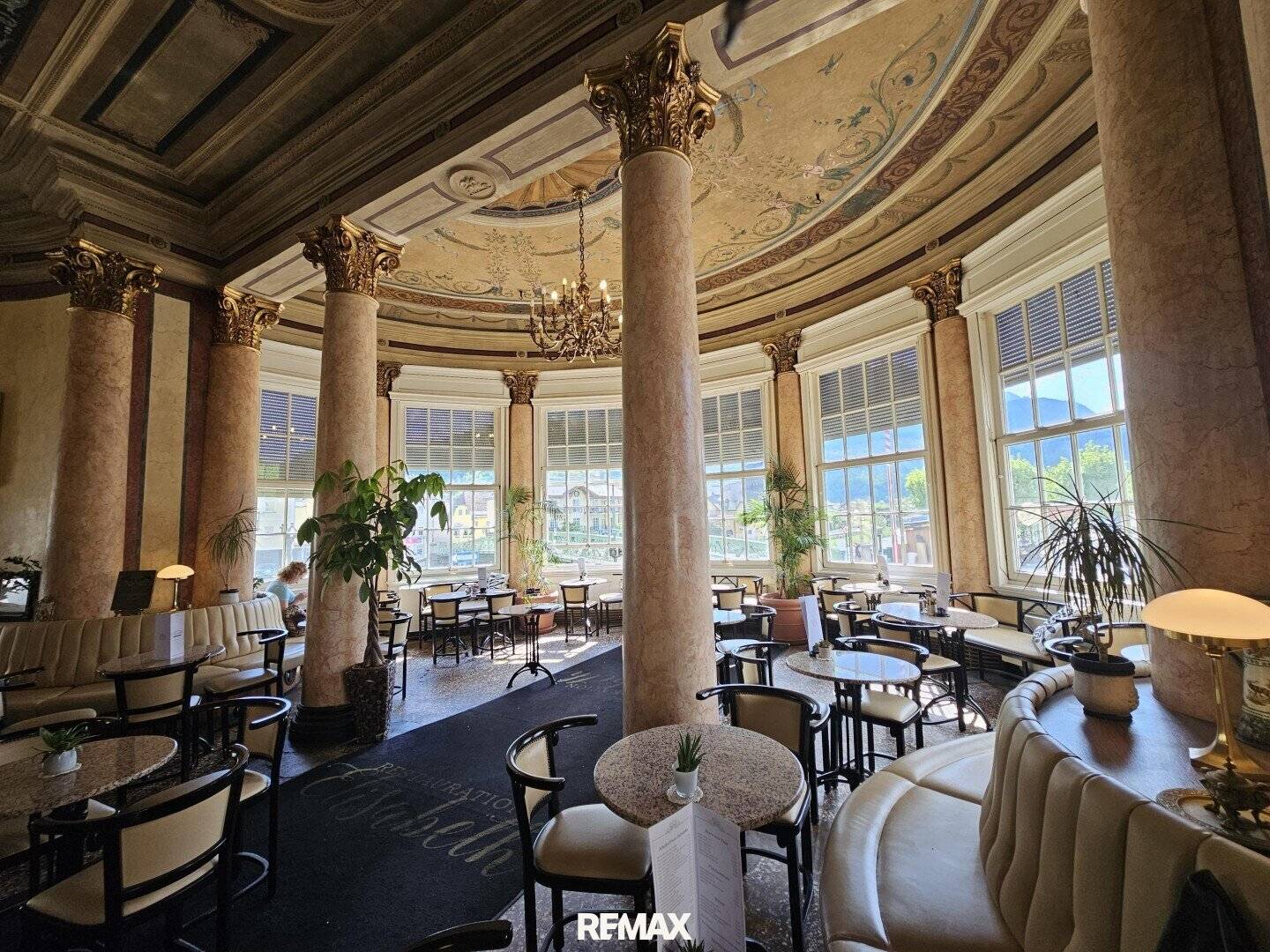 Gastronomy in historic building with view of the Traun