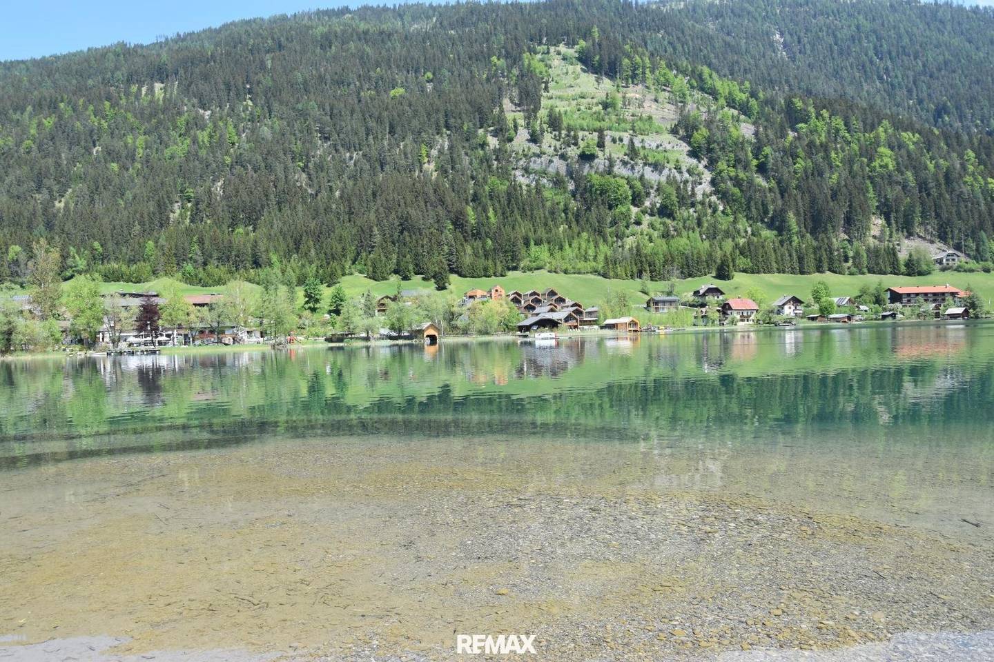 Seegrundstücke mit Parkplätzen am Weissensee