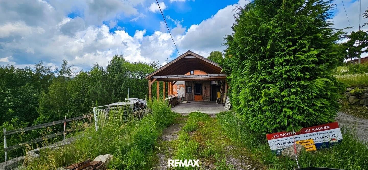 Einfamilienhaus mit Garten und Carport in ruhiger Lage
