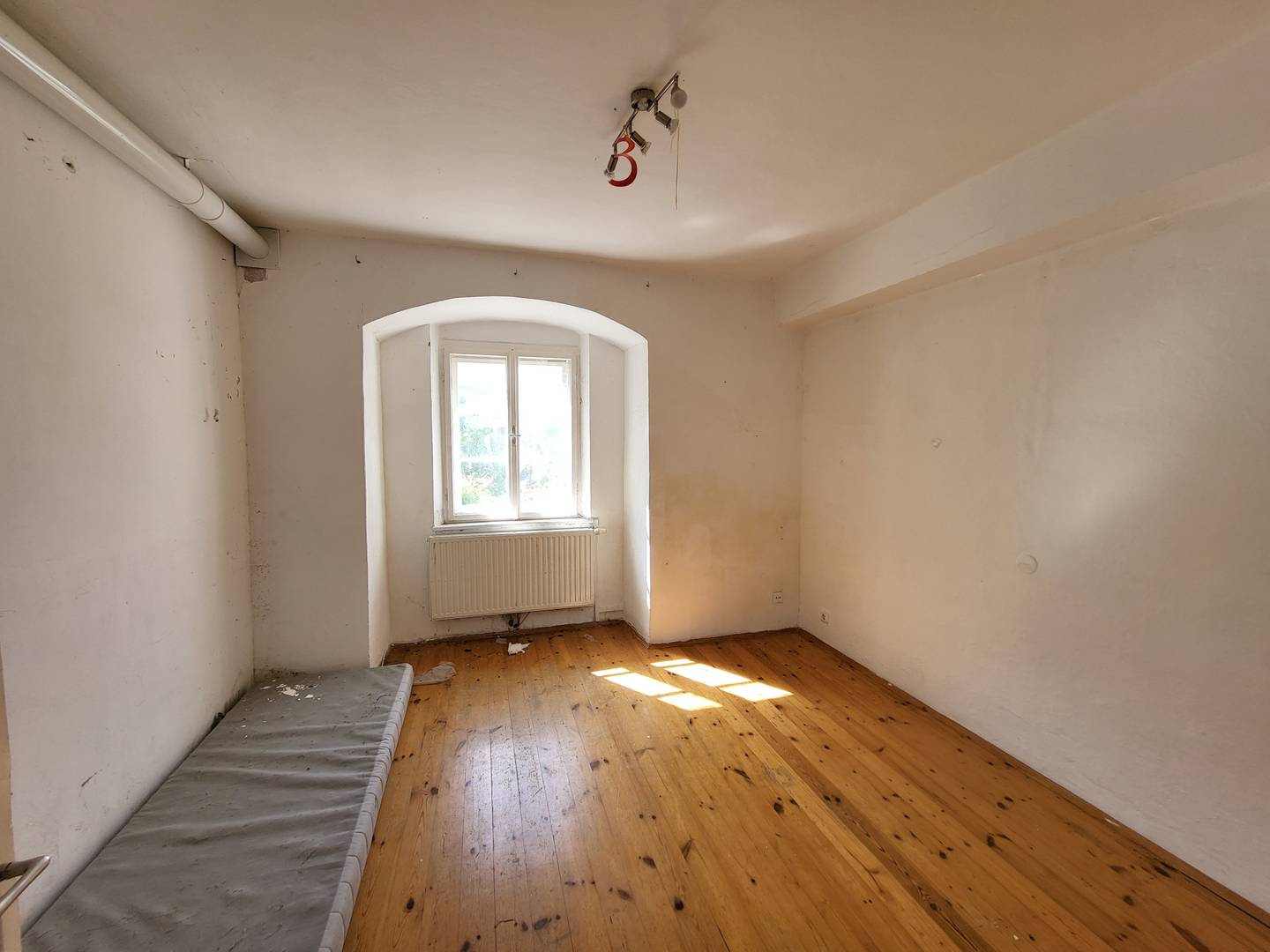 Denkmalgeschützte Wohnung im Zentrum mit Ausbaupotenzial