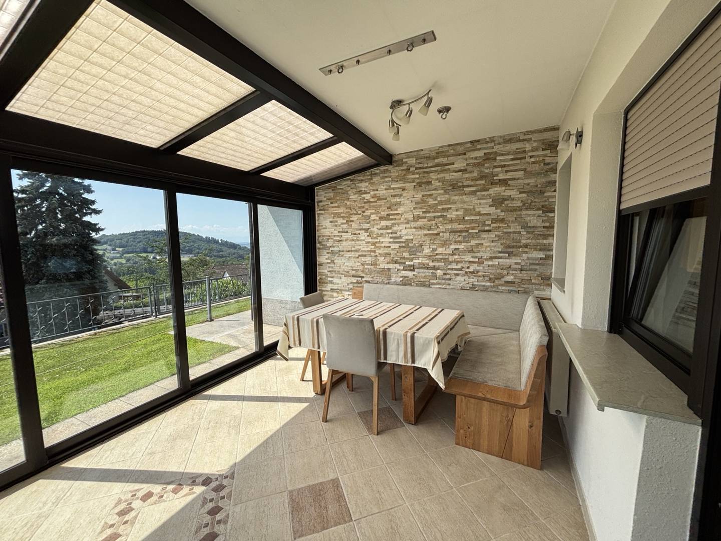 Duplex house with winter garden and sauna offering scenic views