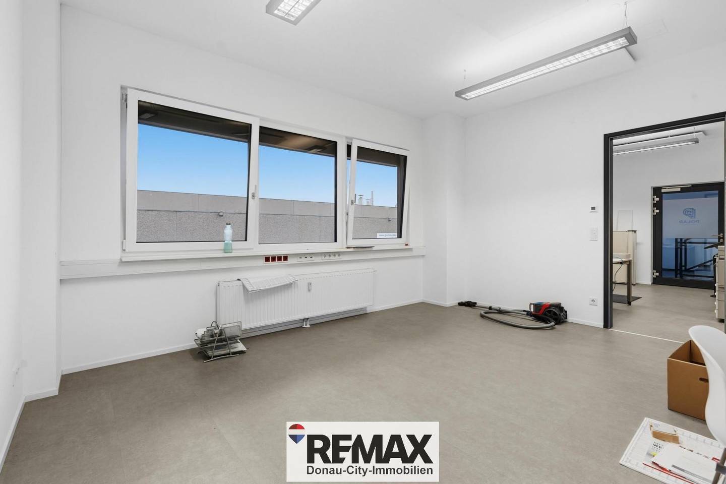 Modern office space with three bright rooms