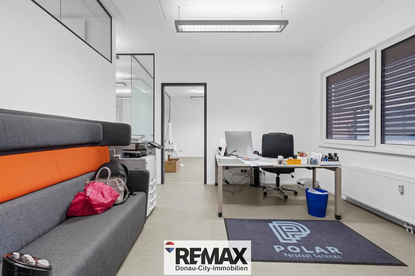 Modern office space with three bright rooms
