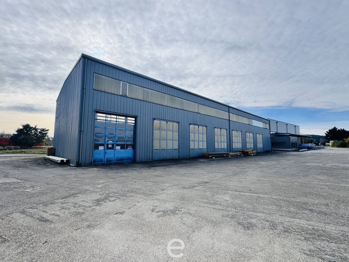Warehouse hall with overhead crane and roller doors in Schlatt