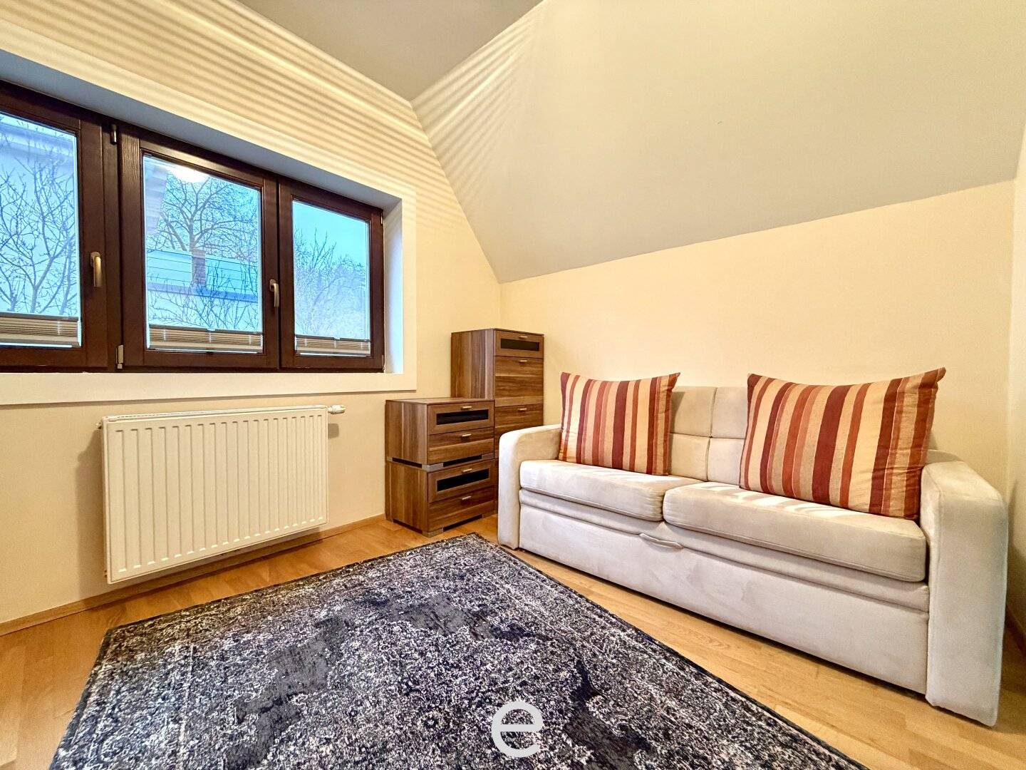 Stylish semi-detached house with roof terrace, garden and double carport in Gaaden