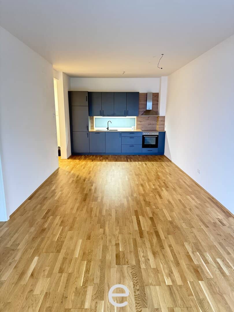 Neubauwohnung mit Balkon und Tiefgarage in zentraler Lage
