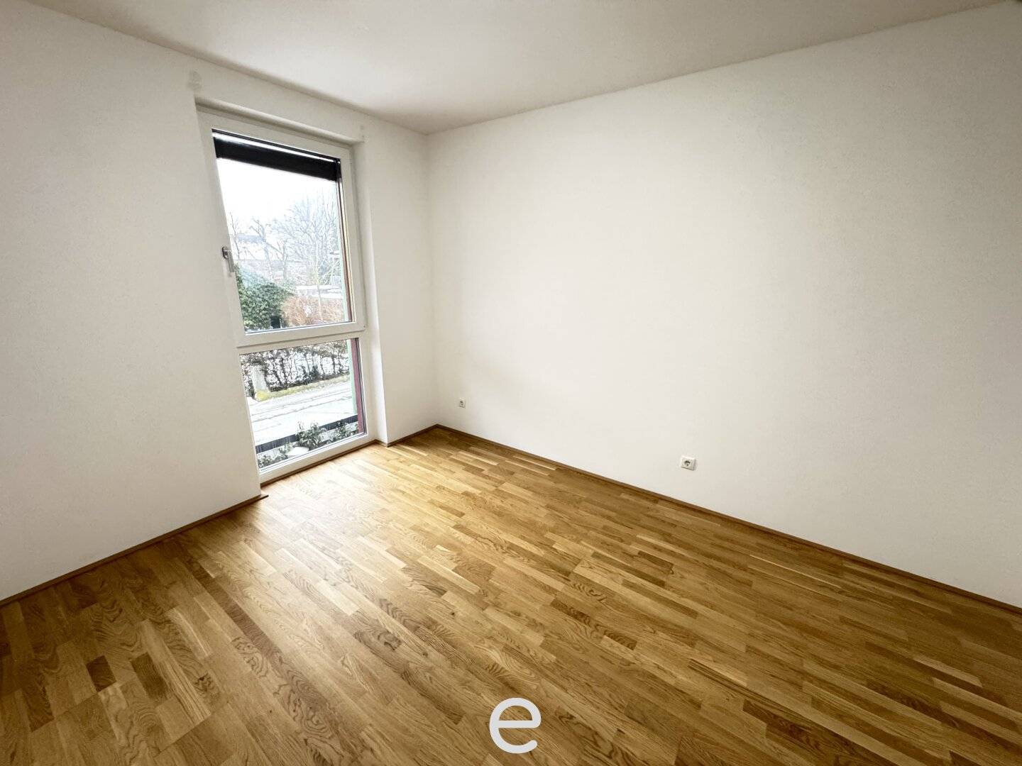 Neubauwohnung mit Balkon und Tiefgarage in zentraler Lage