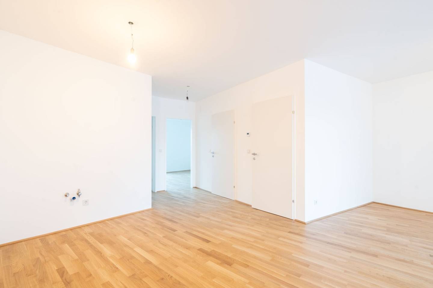 PROVISIONSFREI – Top-Erstbezug in Wels: Stilvolle Wohnung mit Balkon und Tiefgarage zu kaufen!