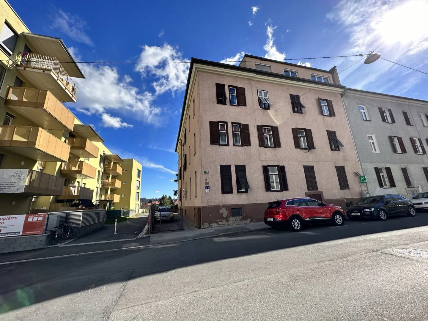 Four story rental property with 16 residential units and subsidized attic conversion