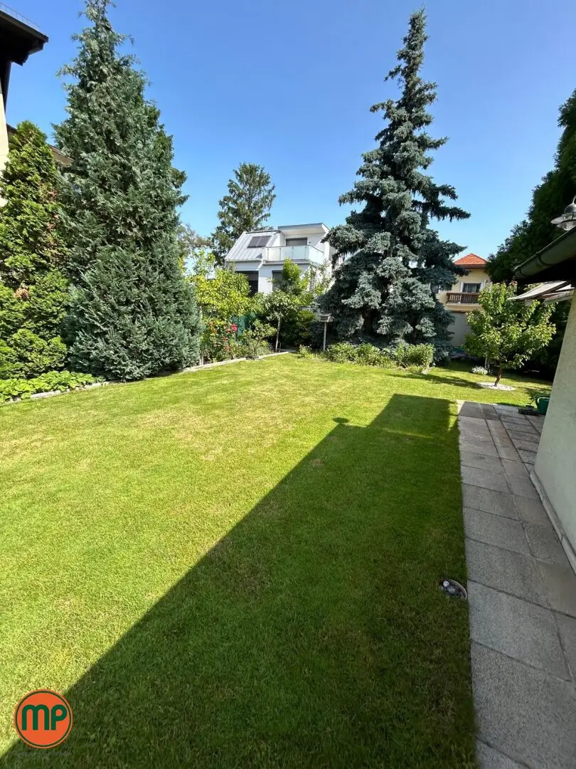 Ein Zuhause am Wasser: Haus mit Garten und bestehendem Wohnrecht an der Neuen Donau
