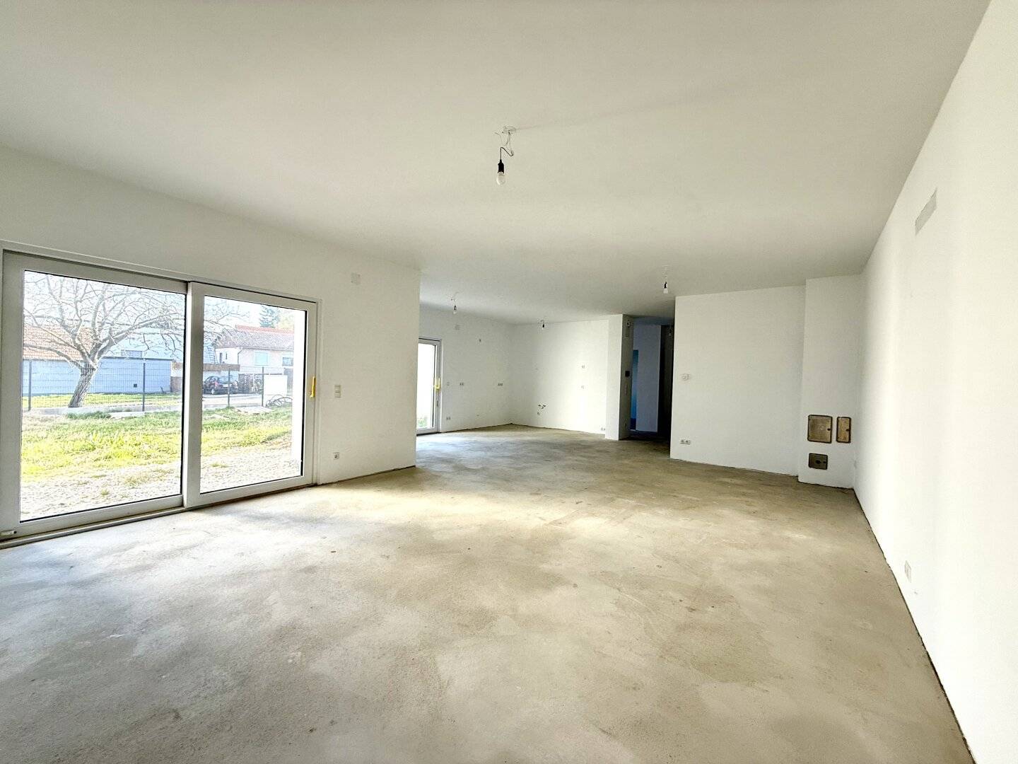 Wohnen mit Stil in Sigleß – Garage, Garten und Dachterrasse inklusive