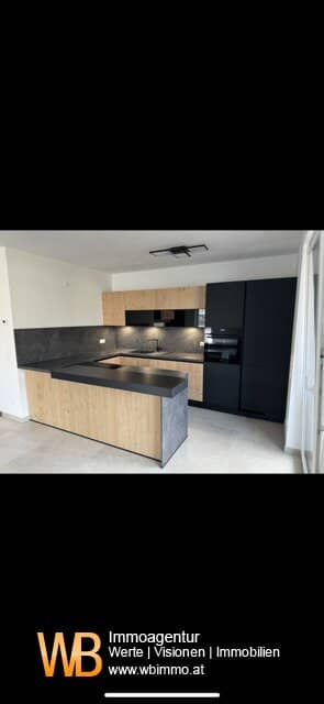 NEUBAU ~60m² + 13m2 Loggia + Garage + Blick auf den Braunsberg