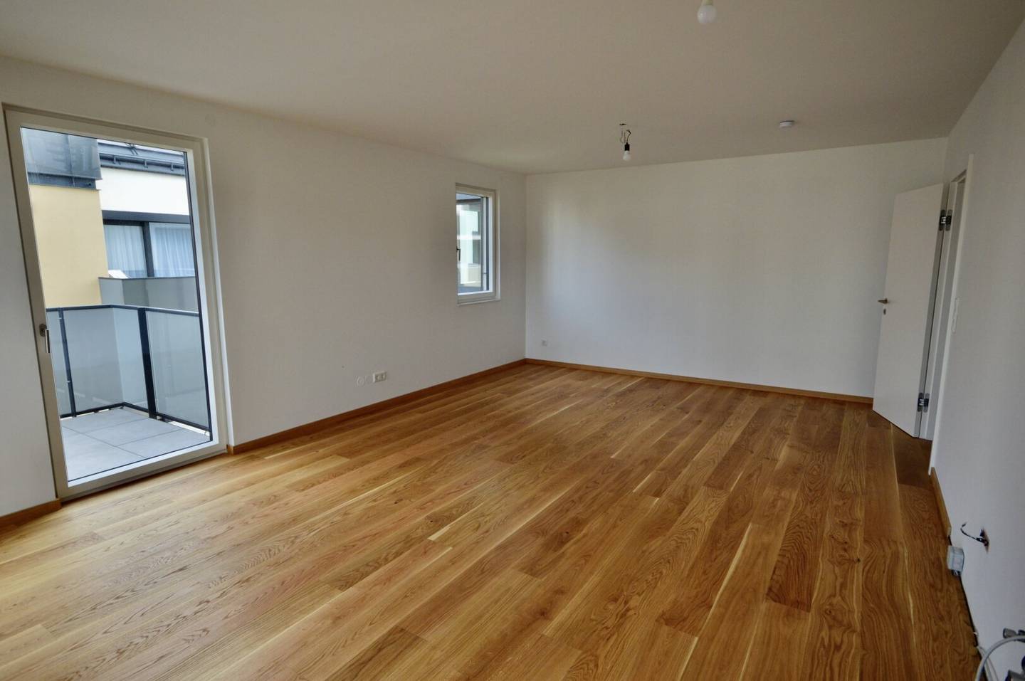 Apartment with spacious balcony overlooking greenery - heated and cooled with geothermal energy (commission-free)