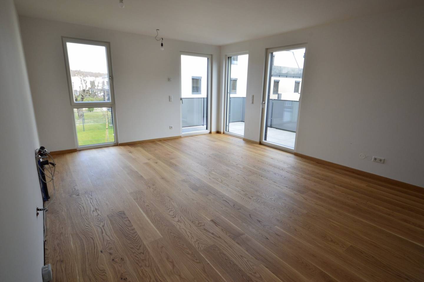 Apartment with spacious balcony overlooking greenery - heated and cooled with geothermal energy (commission-free)