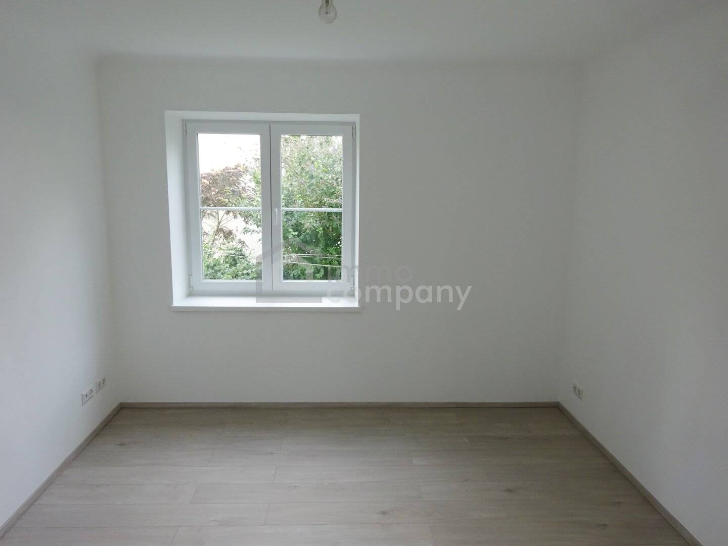 Wohnung mit Garten im Hochparterre Erstbezug