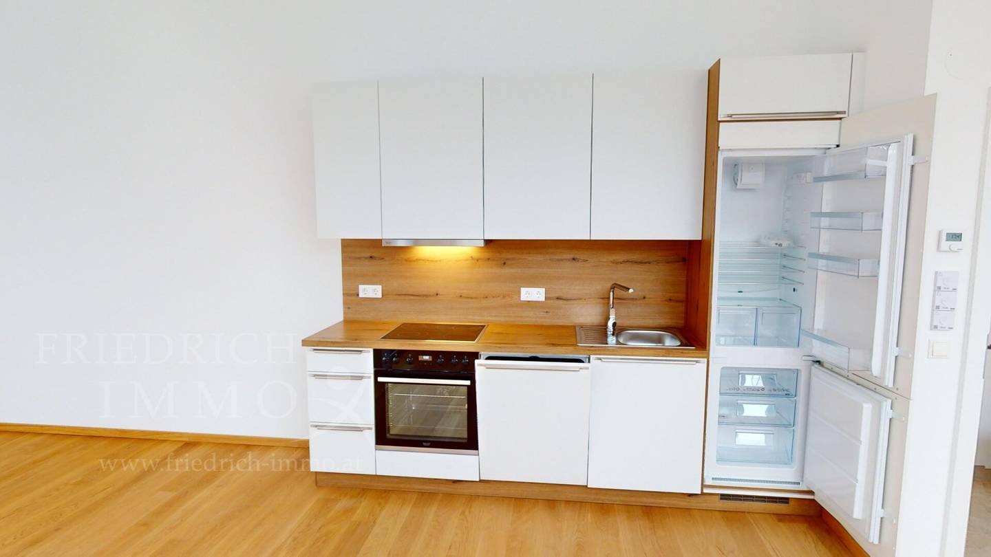 Rented 2-room attic apartment with terrace, investment in the climate-neutral new build, rented until 2034