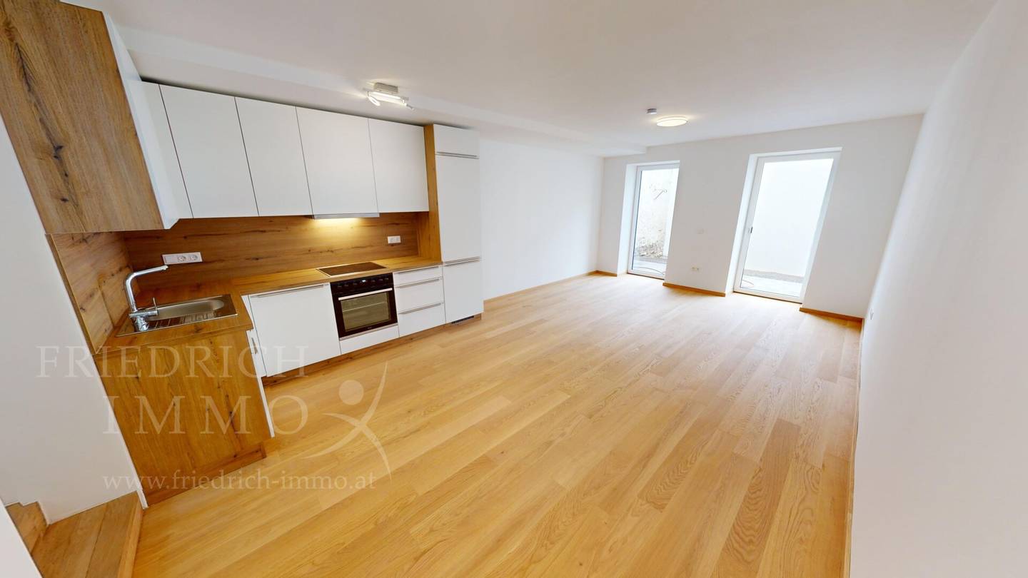Nachhaltiges Wohnen mit Terrasse und Garten – Neuwertige 3-Zimmer-Wohnung für Anleger