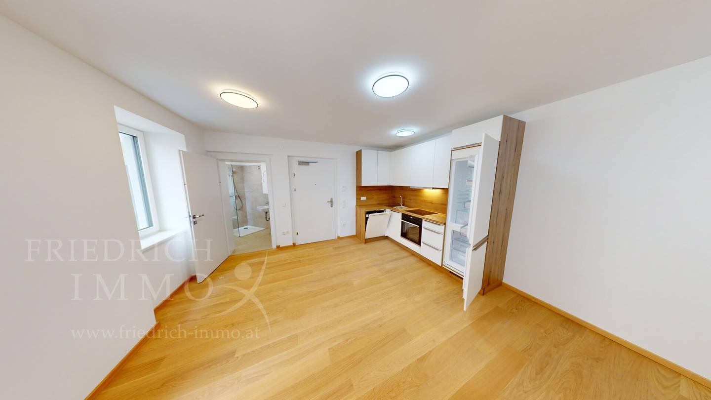 Vermietete 2-Zimmer-Anlegerwohnung mit Balkon im klimaneutralen Neubau, vermietet bis 2034