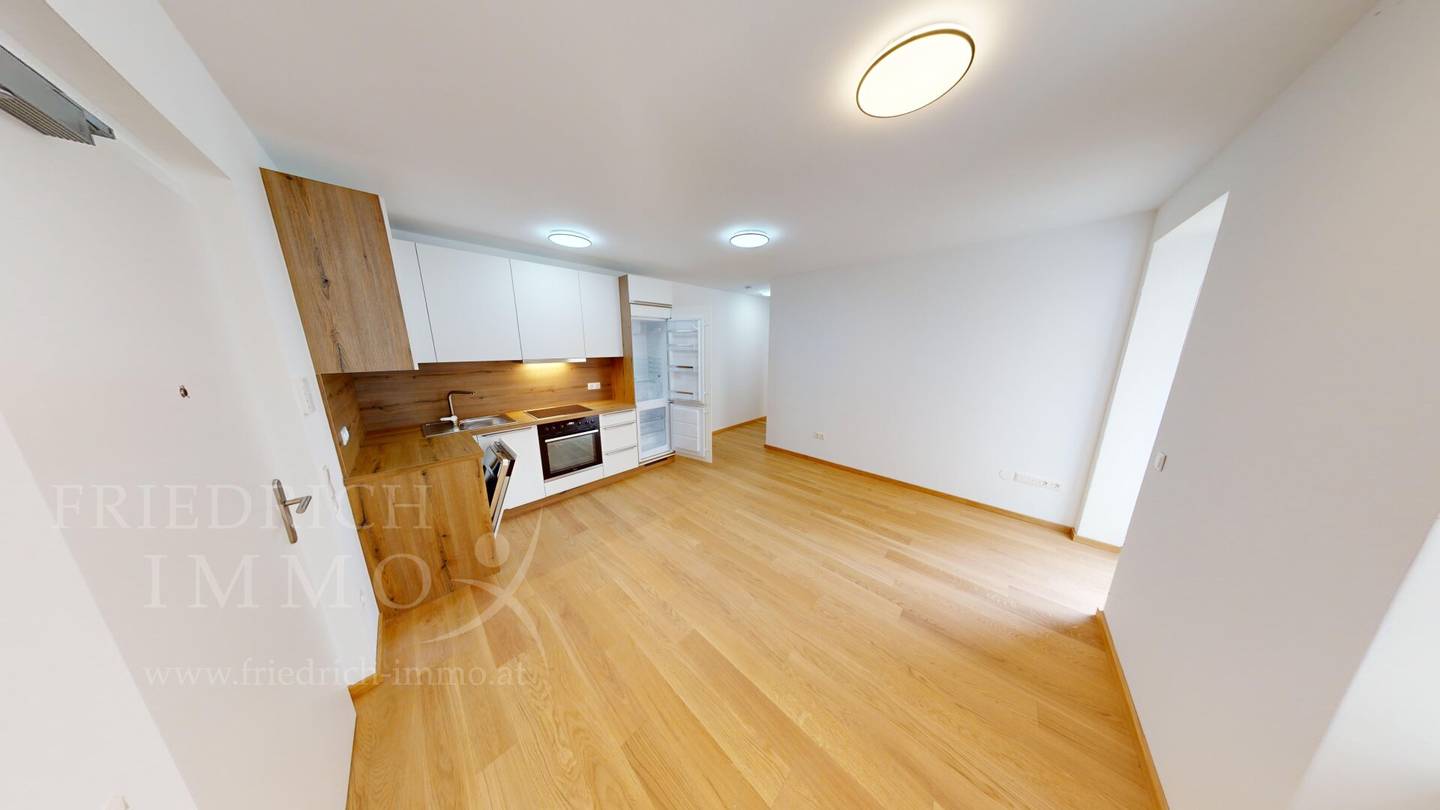 Vermietete 2-Zimmer-Anlegerwohnung mit Balkon im klimaneutralen Neubau, vermietet bis 2034