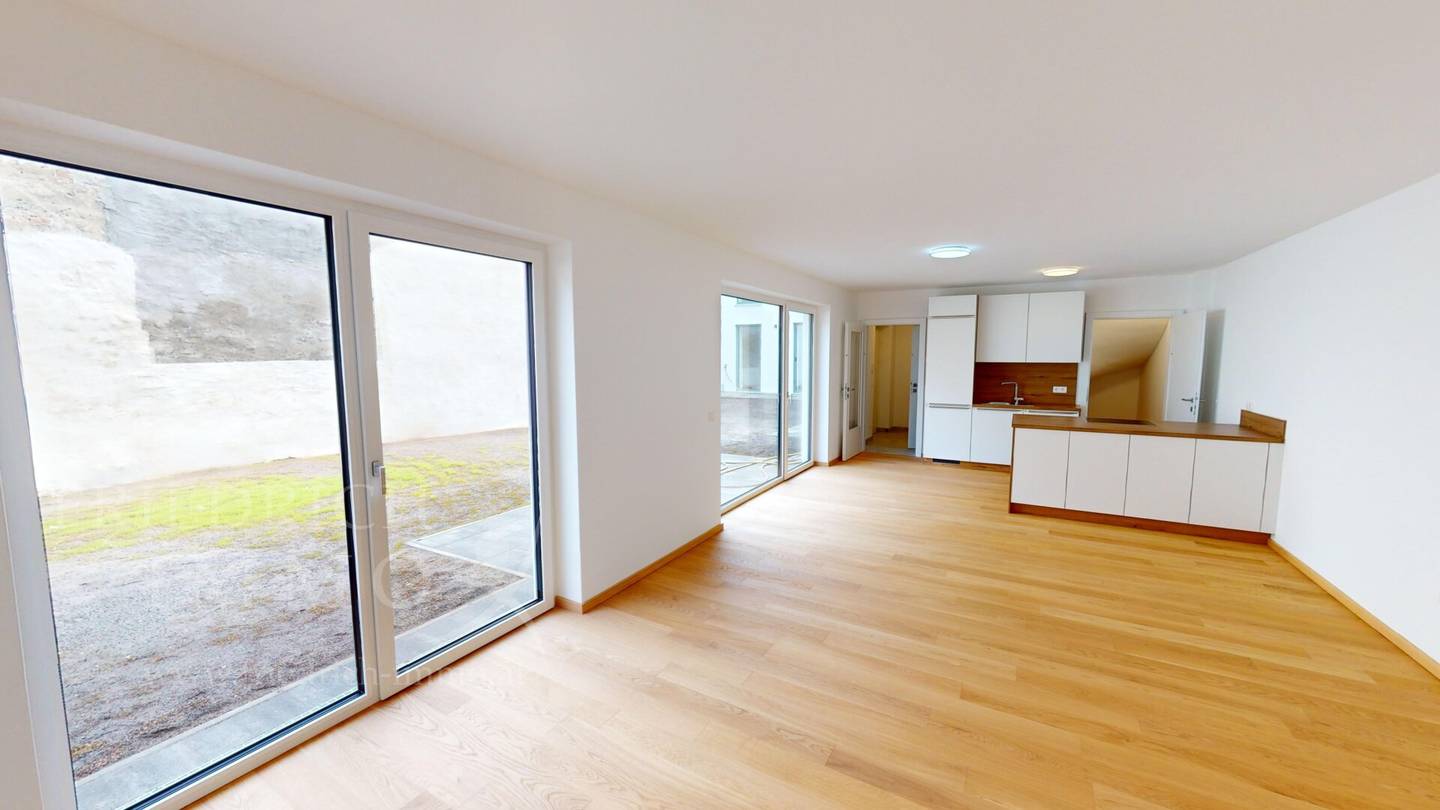 Seltene Gelegenheit: Vermietetes Hofhaus mit Privatgarten in Atzgersdorf – vermietet bis 2034
