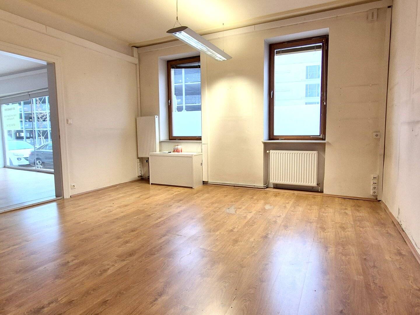 BADEN, centrally located, ground-level commercial premises / office with large street-facing glass frontage