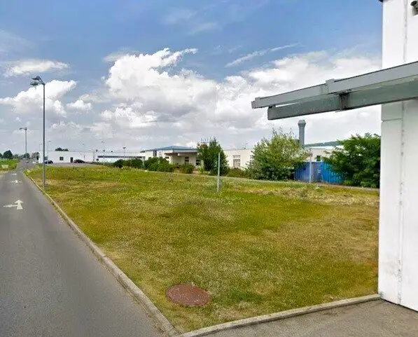8808m² commercial building land with operational building and undeveloped building plot, many parking spaces in the Eisenstadt commercial area