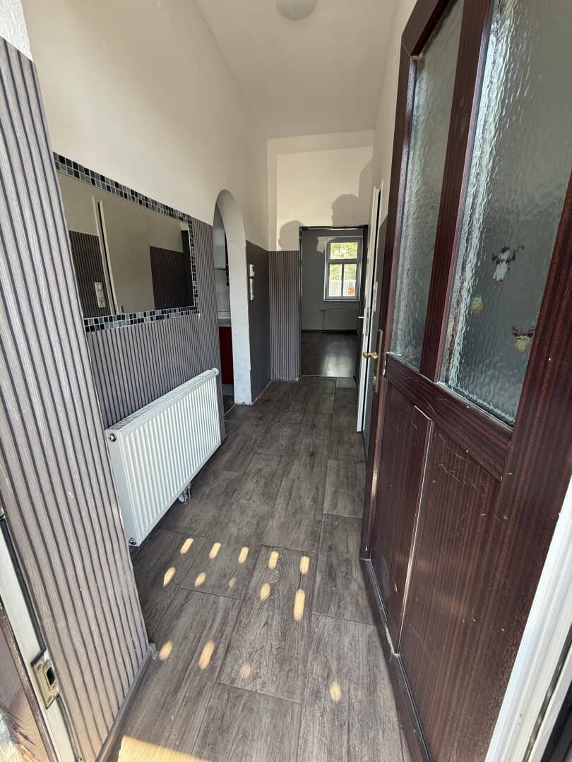 Charming 2-room apartment in need of renovation with terrace and parking space in Gramatneusiedl on the ground floor