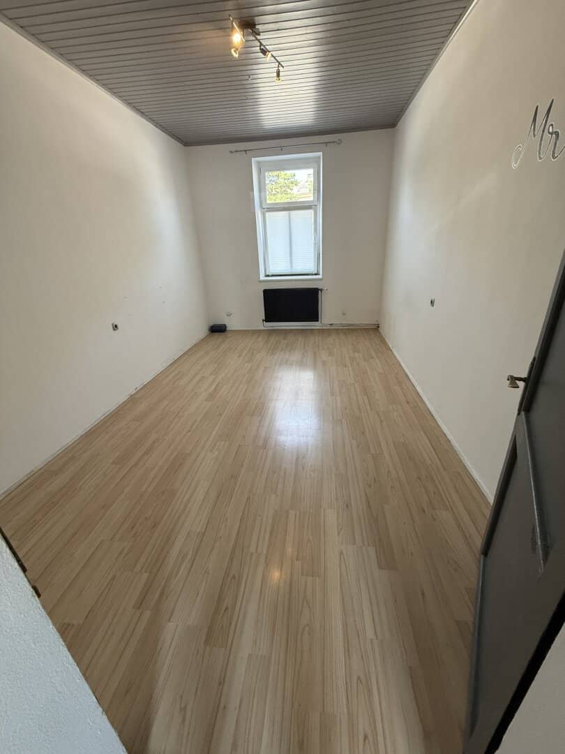 Charming 2-room apartment in need of renovation with terrace and parking space in Gramatneusiedl on the ground floor