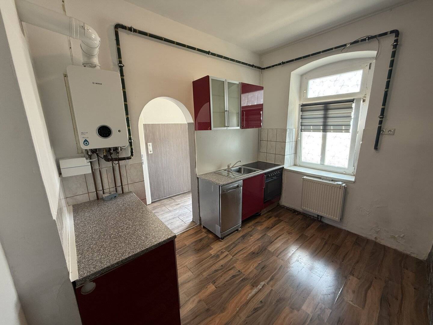 Charming 2-room apartment in need of renovation with terrace and parking space in Gramatneusiedl on the ground floor